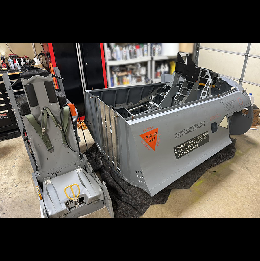 NeoEngress F-16 frame with ACES II ejection seat in work shop